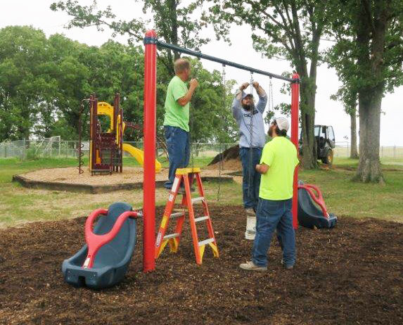 Installing molded bucket swings