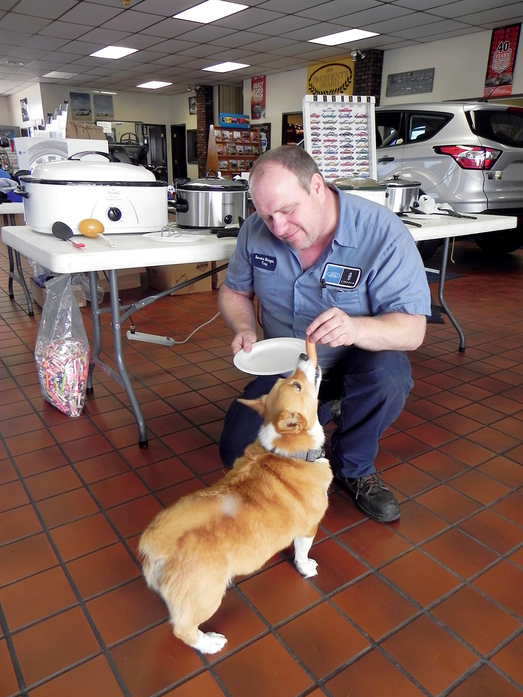 Gertie eats a hot dog